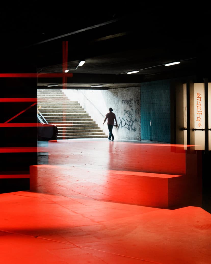 the exit - silhouette stepping through bright doorway in palma old town